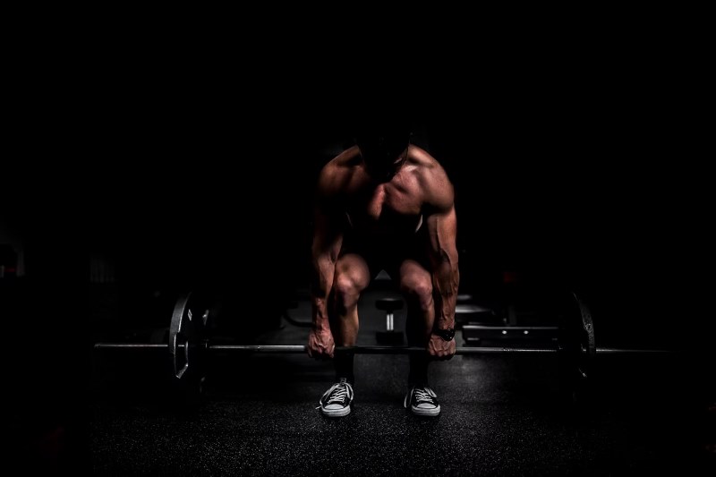 topless man in black shorts sitting on black and silver barbell photo – Free Fitness Image on Unsplash
