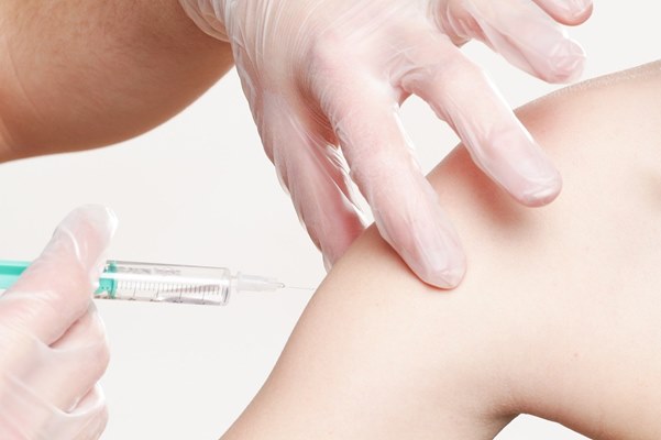 vaccination, giving medicine, inserting injection